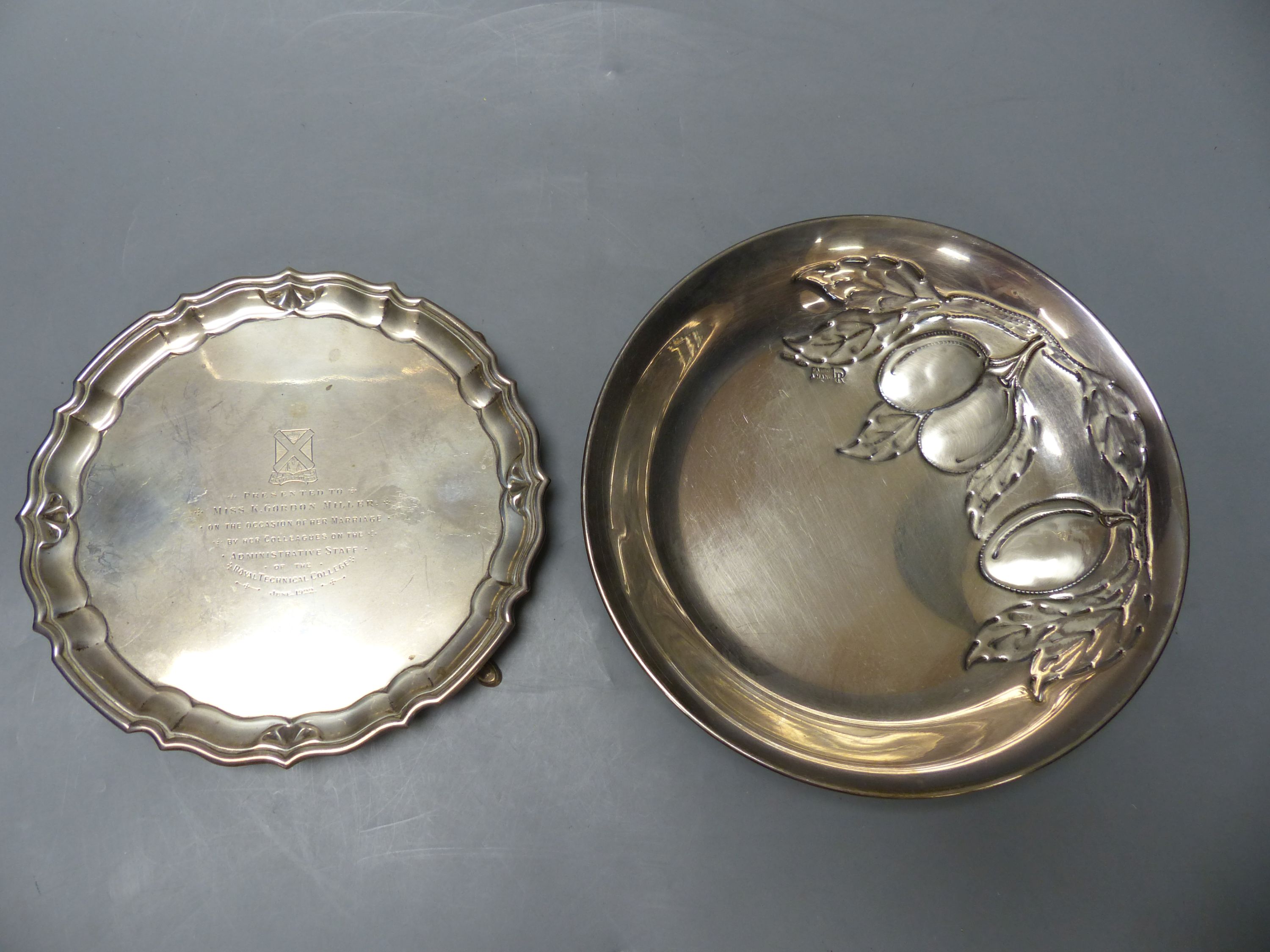 A George V silver waiter, Chester, 1921, 17.9cm and an Italian 800 standard white metal bowl embossed with fruit